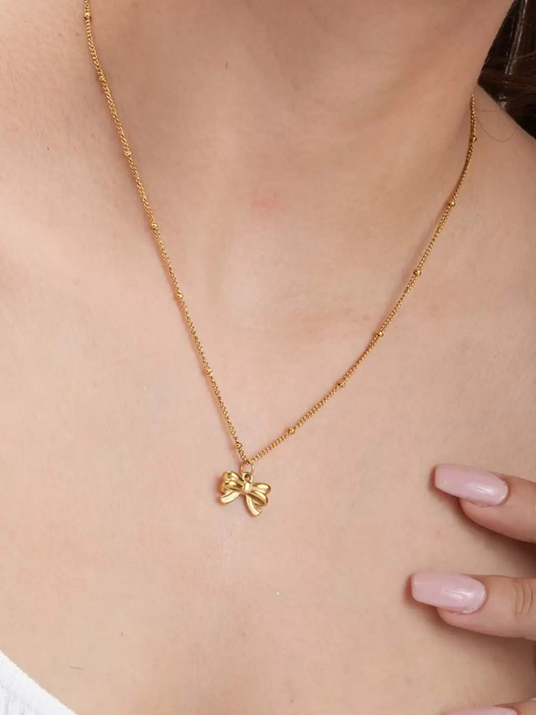 Bow antitarnish neckpiece