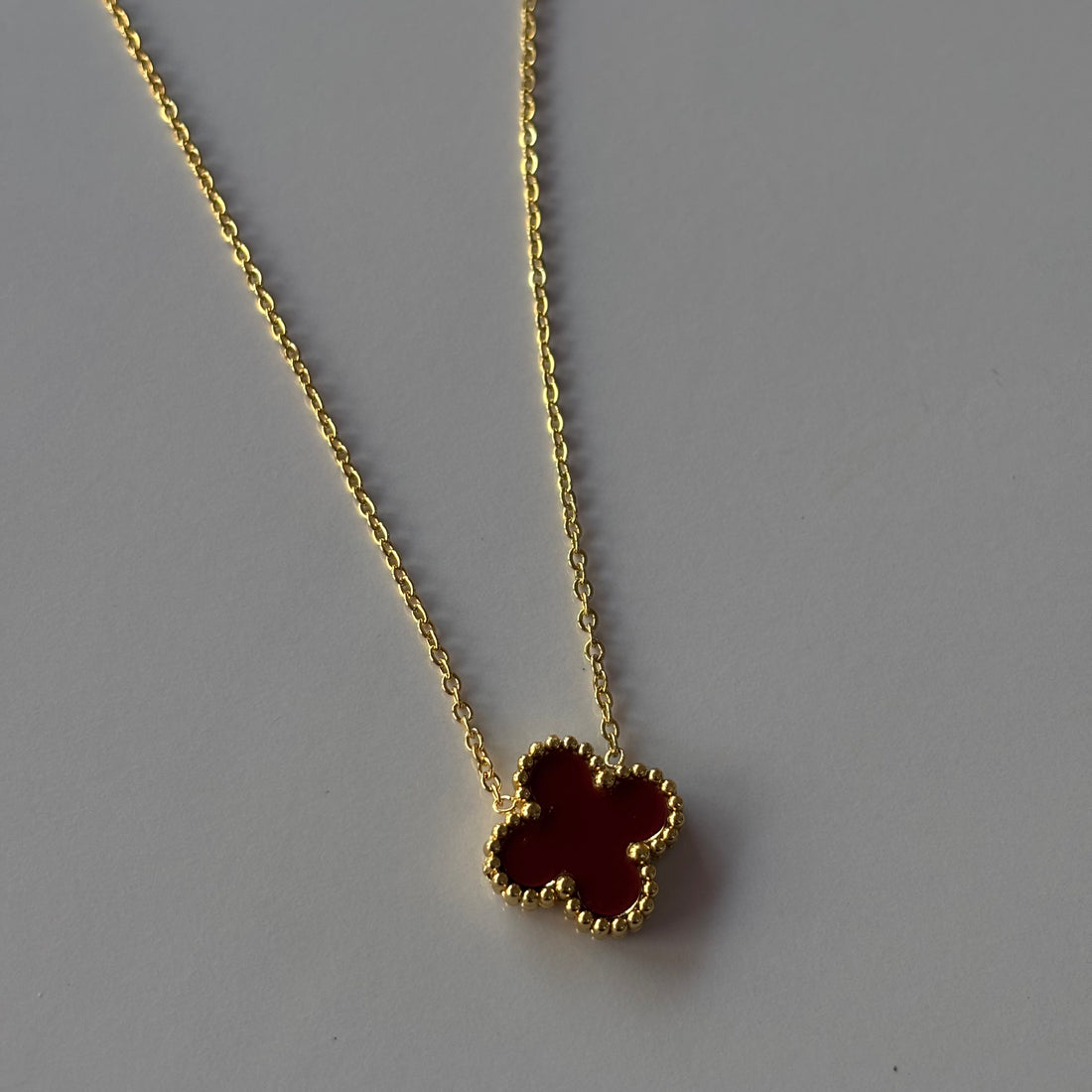 Maroon clover neckpiece