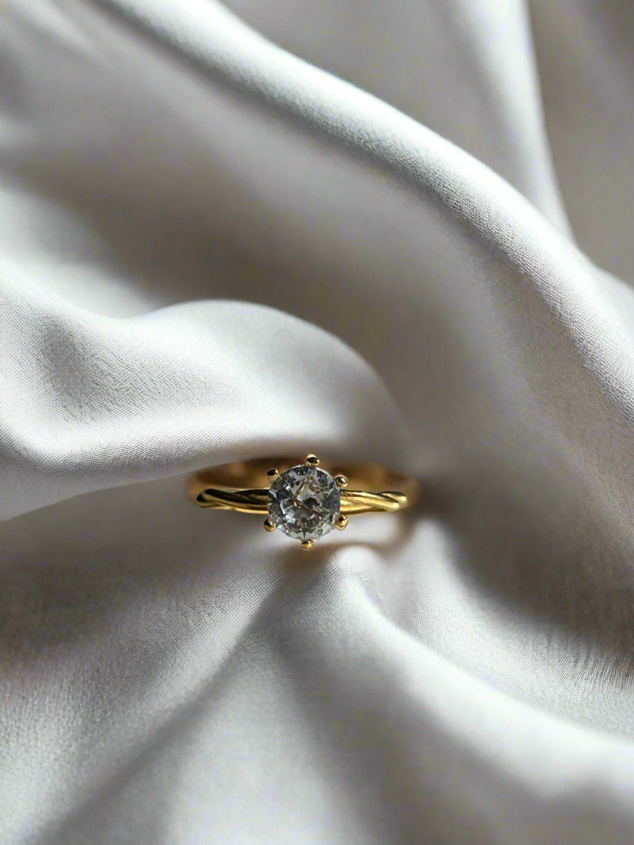 Radiant Muse Twisted Solitaire Ring