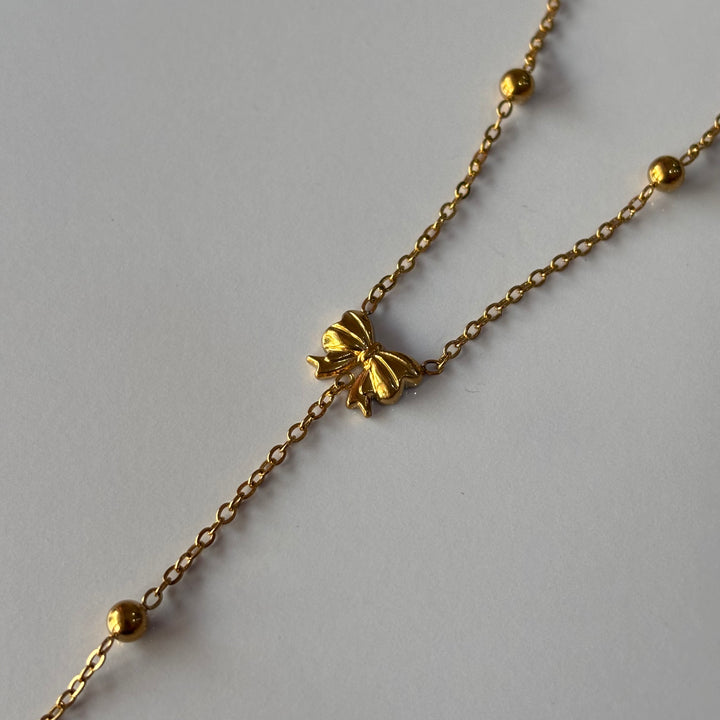 Bow droplet ball chain neckpiece