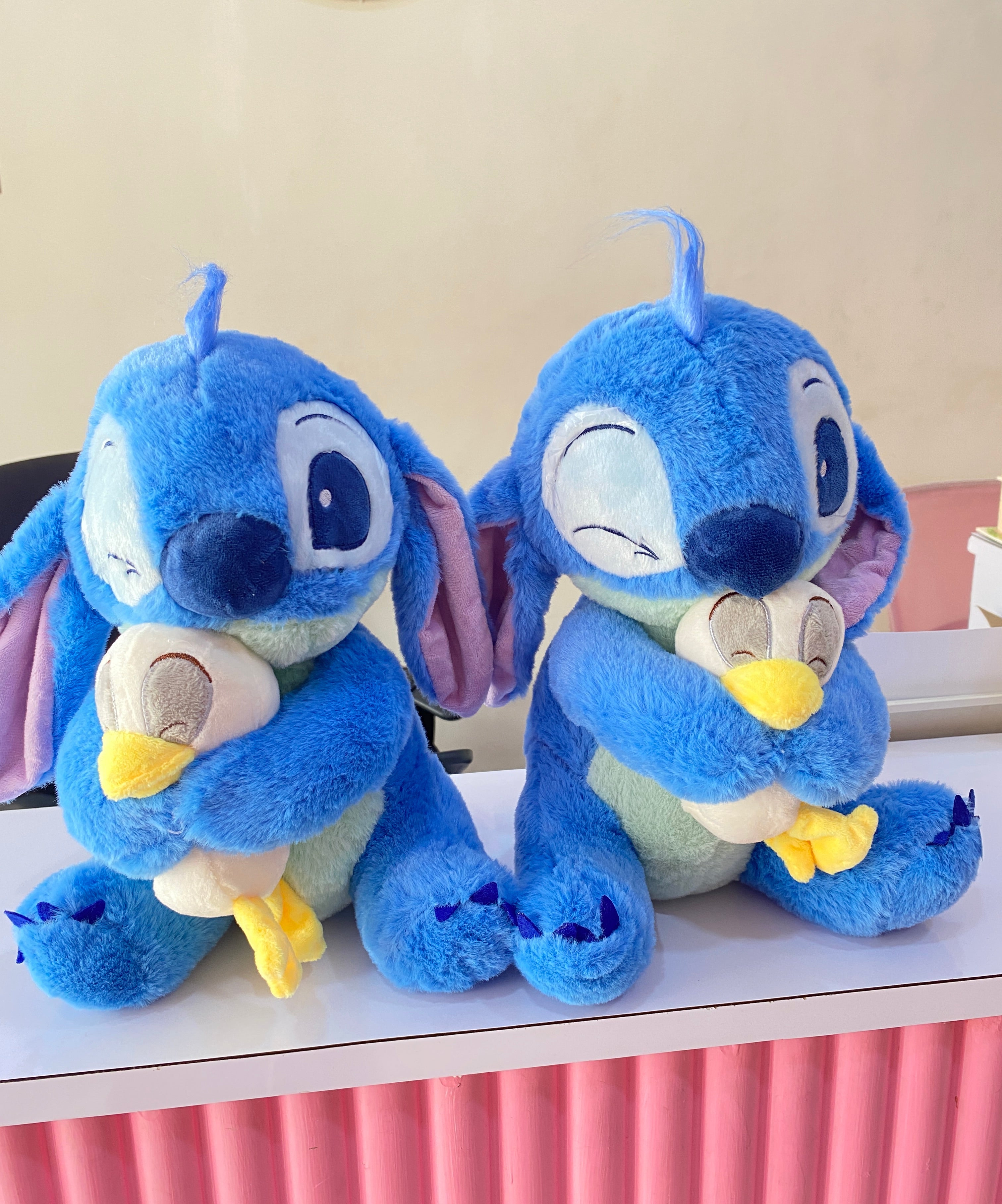 Stitch hugging duck plushie