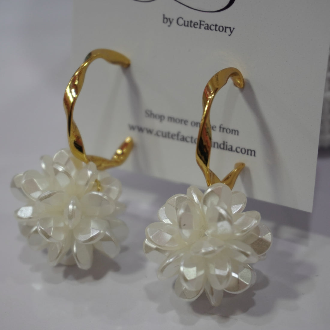 White flower ball hoop earrings