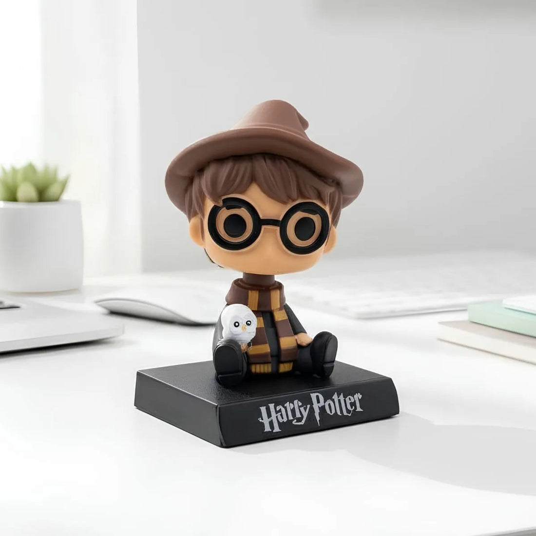 HP bobblehead with mobile stand