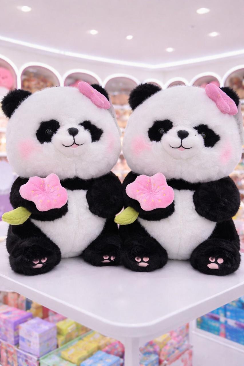Rotating flower panda soft toy
