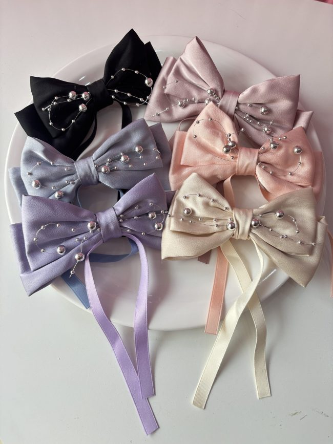 Silver pearl bow